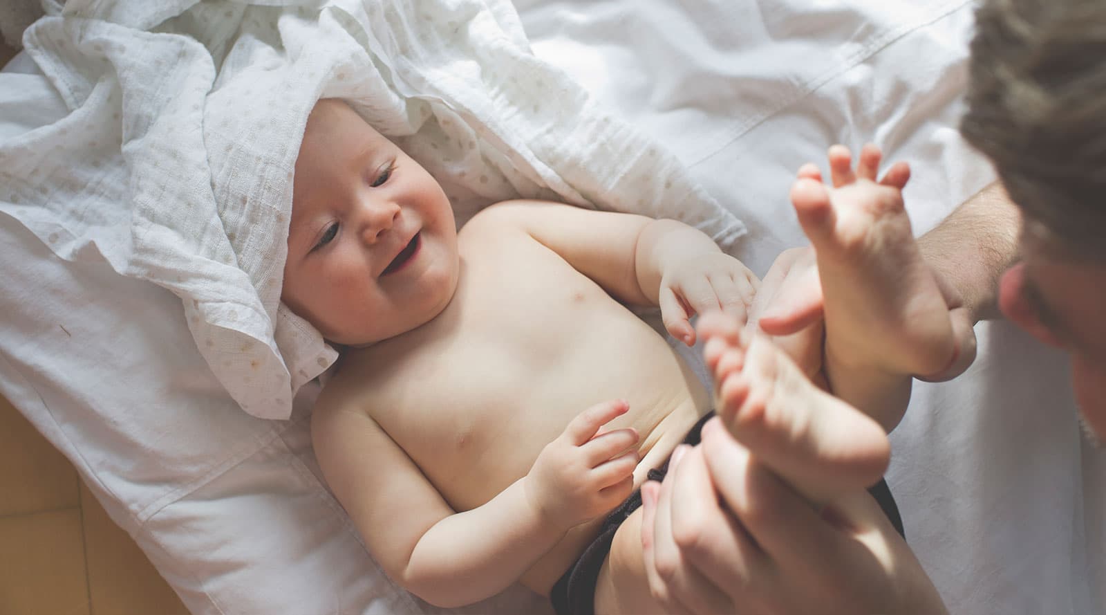 baby getting their nappy changed